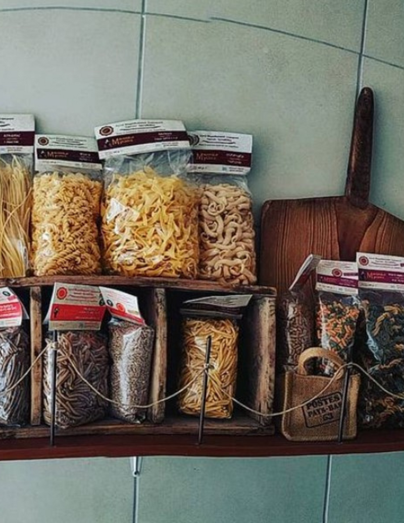 A variety of pasta products including different shapes and legume flavors