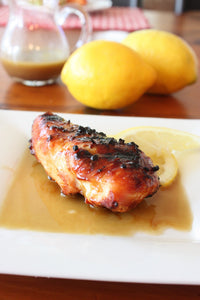 Grilled chicken breast in a lemon sauce