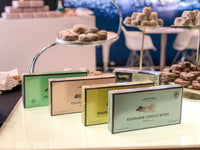 Assorted flavors of Chrisanthidis Kourabie cookies with Choco Bites in the foreground