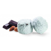 Chrisanthidis Kourabie Chocobites next to almonds and pieces of chocolate