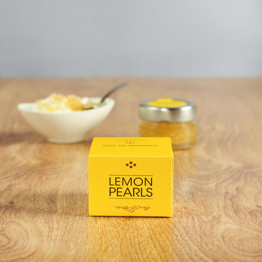 Box of Messino Lemon Pearls with jar and bowl of ice cream in the background