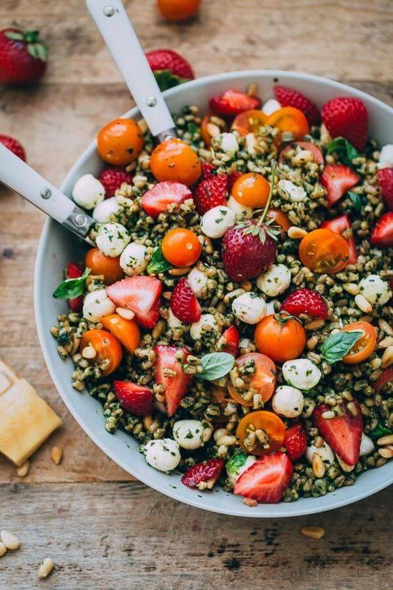 Bowl of summer salad with lemon pearls and drizzled with Messino Blasamic Glaze with Honey